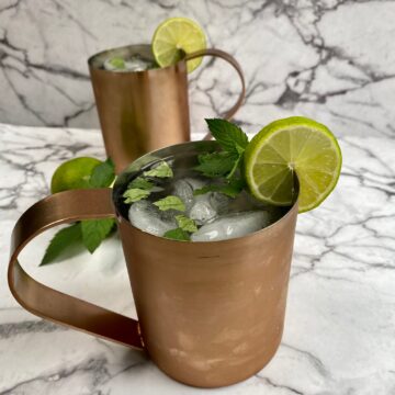 virgin moscow mule in a copper mug with fresh mint and lime