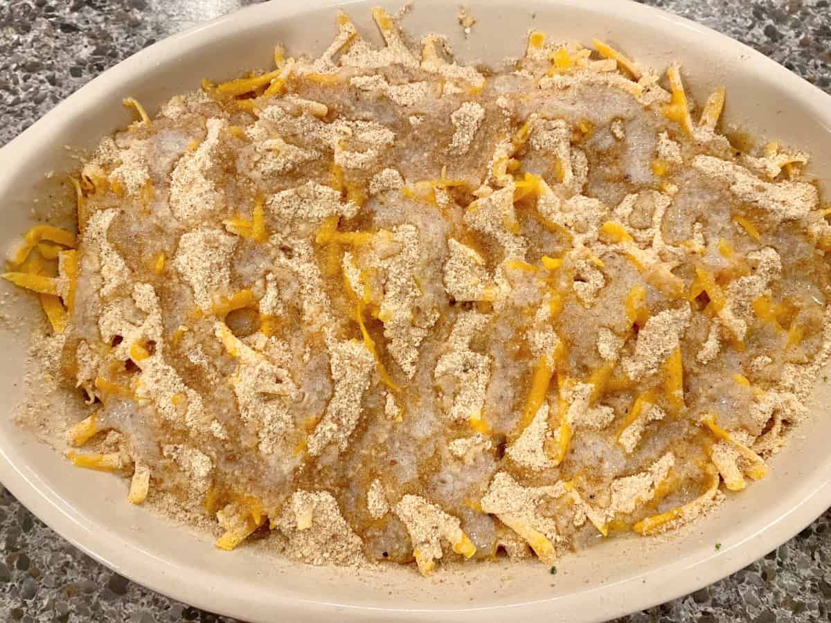 making broccoli and cheese gratin with bread crumb topping